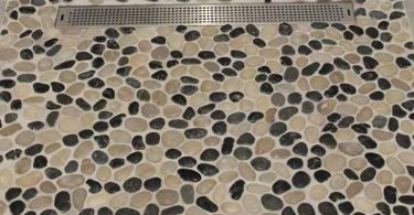 What Are The Possible Advantages And Downsides Of A Stone Shower Floor?