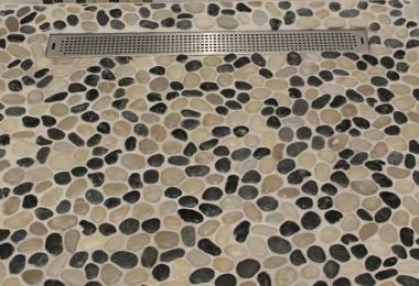 What Are The Possible Advantages And Downsides Of A Stone Shower Floor?